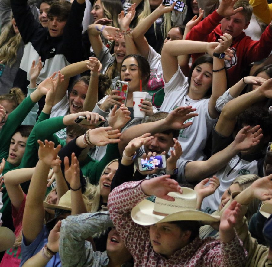The student section gets loud during a varsity boys basketball game.