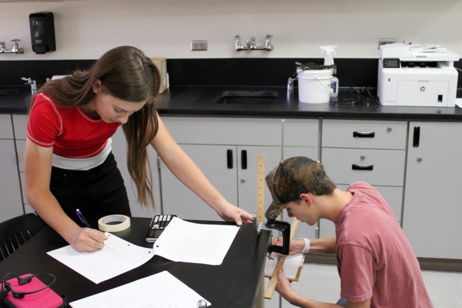 Seniors Shay West and Jayton Hill participate in an AP physics lab on the Angelo State University campus.
