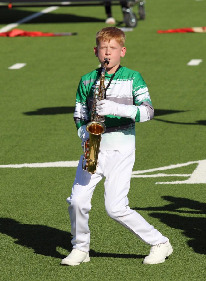 Eighth-grader Brody Mulnar performs during the Concho Classic. Eighth-graders are marching with the high school band this year.